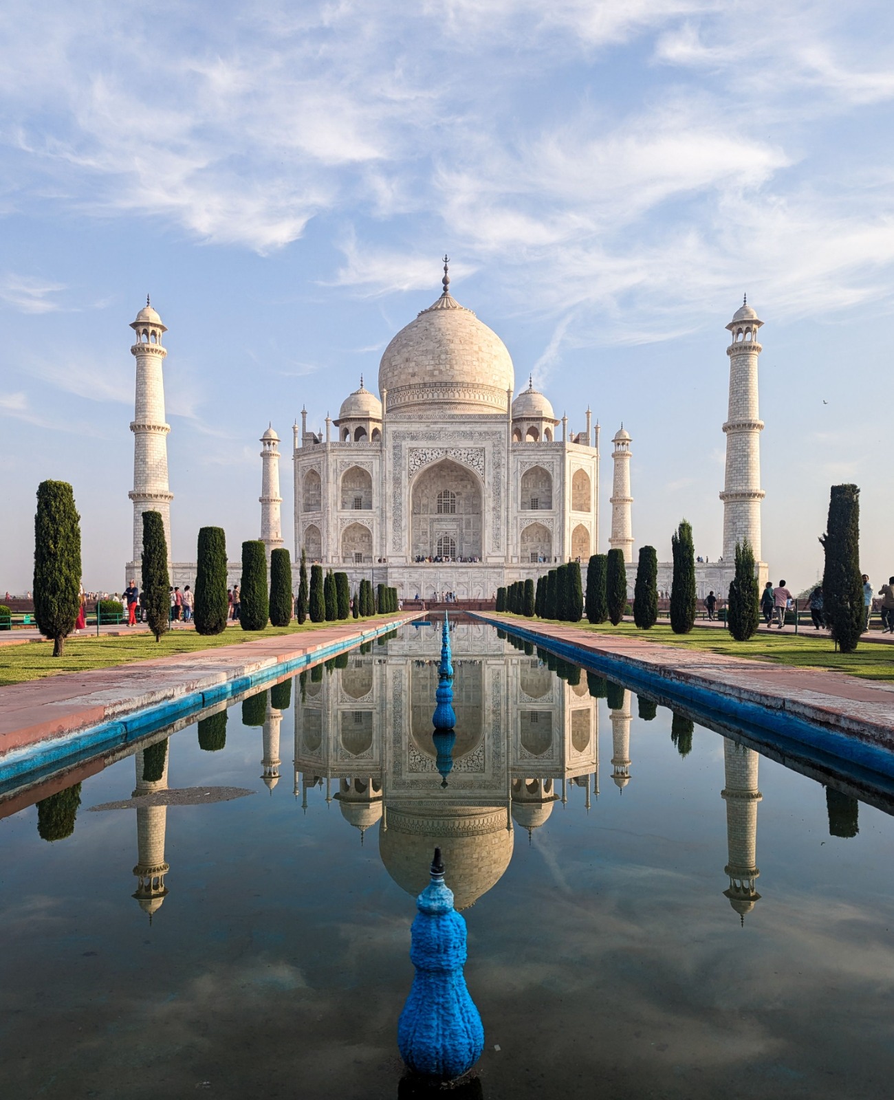 Classic view of the Taj Mahal reflected in the long central pool